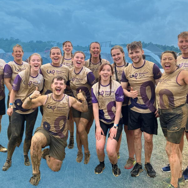 PIB Risk Management team after completing the Tough Mudder charity event for Weston Park Cancer Charity.